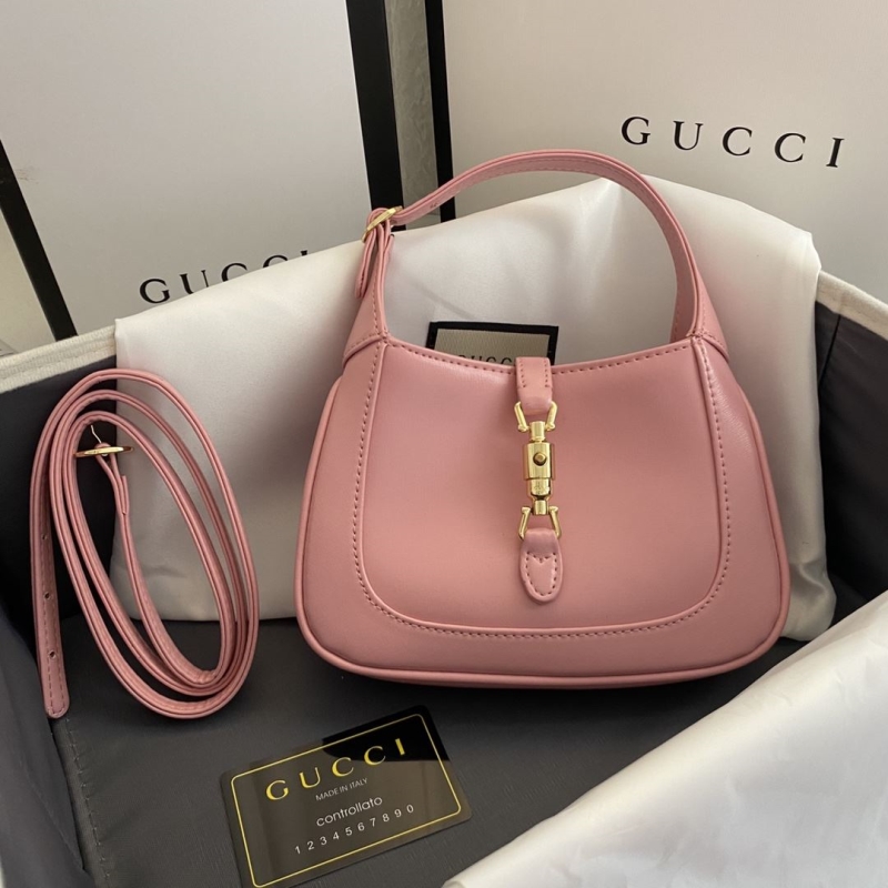 G*u*i top handle bags
